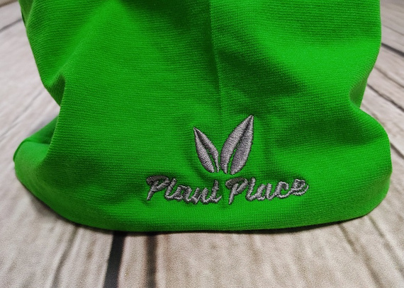 Two-layered cotton hat in green-graphite color.