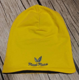 Two-layer cotton hat in yellow-graphite color.